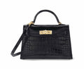 Hermès A SHINY BLACK ALLIGATOR SELLIER MINI KELLY 20 II WITH GOLD HARDWARE