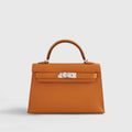 Hermès Kelly Mini Chevre Apricot/Cuivre Sellier Palladium Hardware