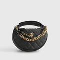 Chanel Quilted Circle Pouch Bag