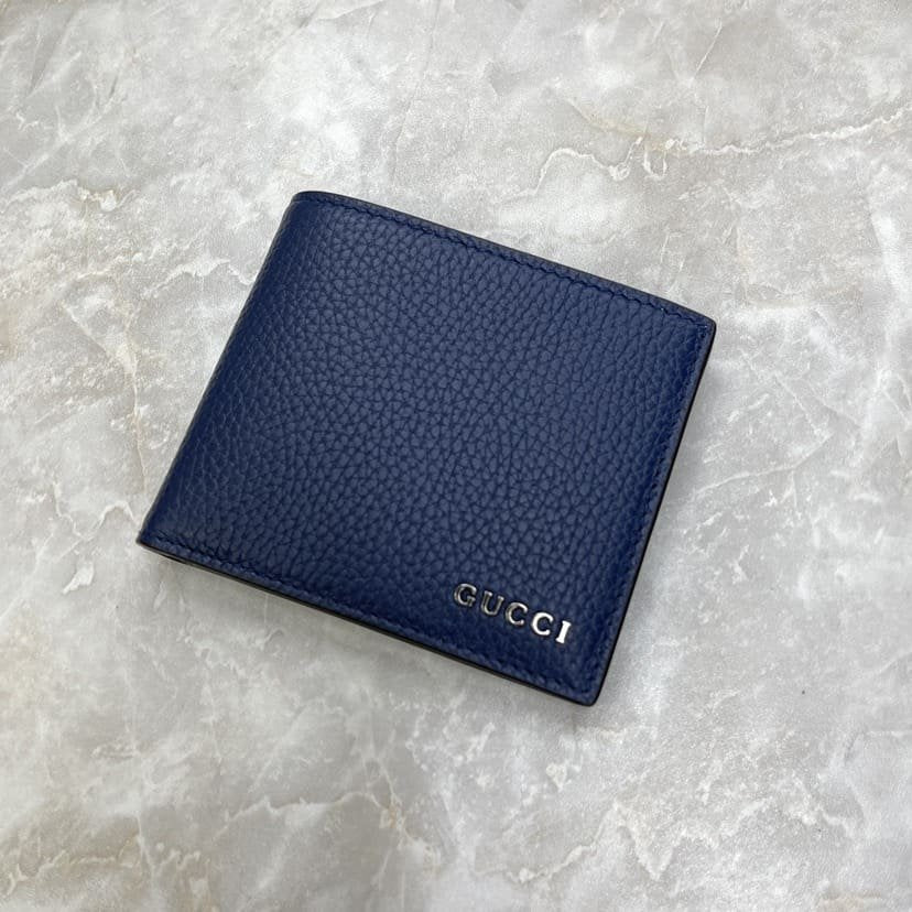 Bi-fold wallet with Gucci script