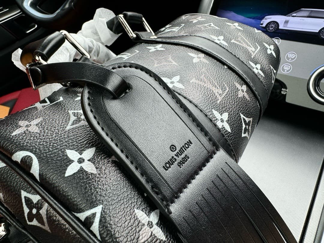 Louis Vuitton M11595 Keepall Bandoulière 25