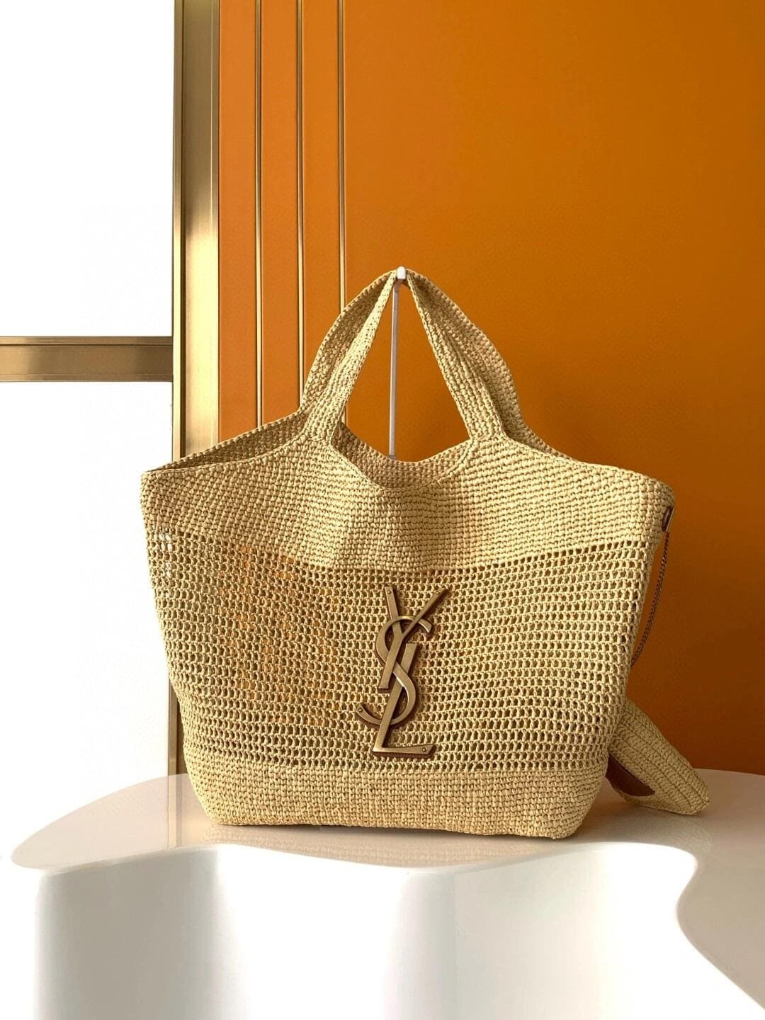 SAINT LAURENT ICARE IN RAFFIA NATUREL AND BROWN GOLD
