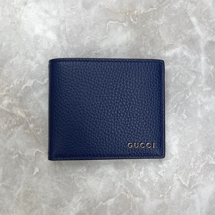 Bi-fold wallet with Gucci script