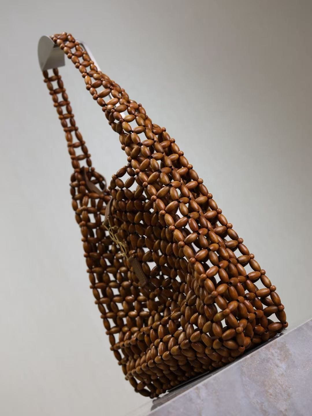 Saint Laurent LE 5 À 7 large in wood beads